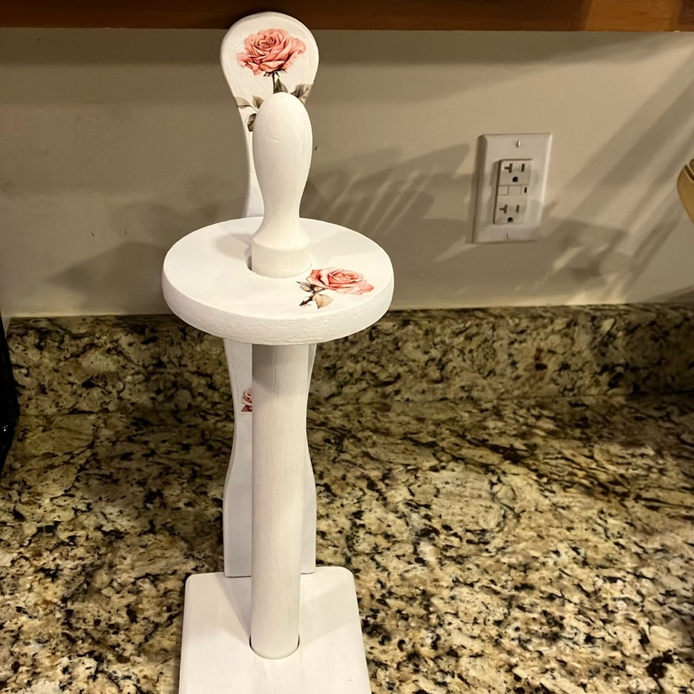 Vintage paper towel holder refinished.